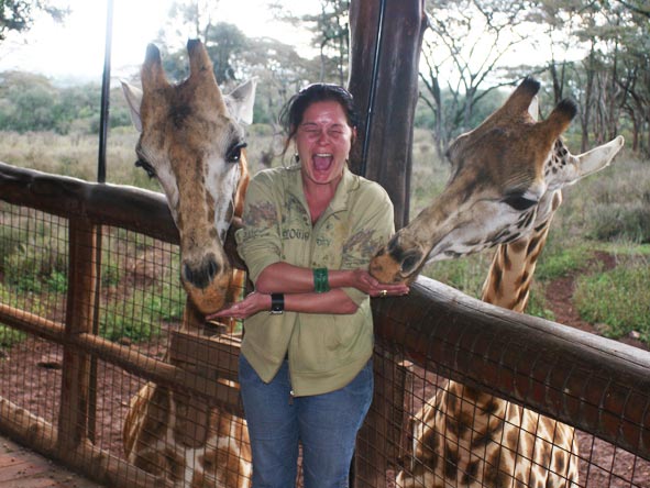 Lauren Johansson - feeding two over-friendly giraffes in Kenya